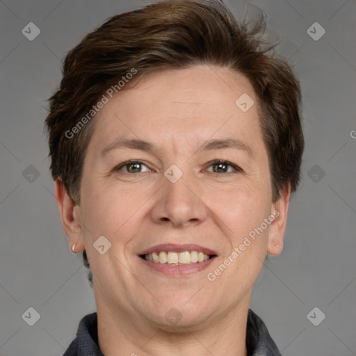 Joyful white adult male with short  brown hair and grey eyes