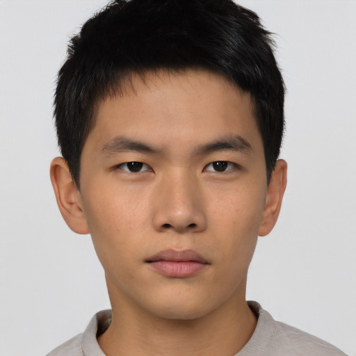Neutral asian young-adult male with short  brown hair and brown eyes