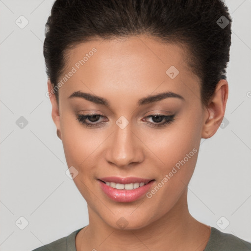 Joyful white young-adult female with short  brown hair and brown eyes