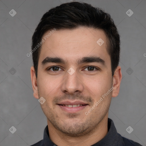 Joyful white young-adult male with short  black hair and brown eyes