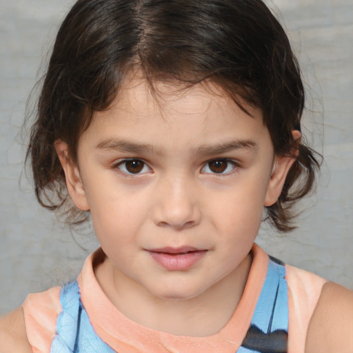 Joyful white child female with medium  brown hair and brown eyes