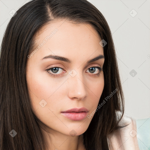 Neutral white young-adult female with long  brown hair and brown eyes