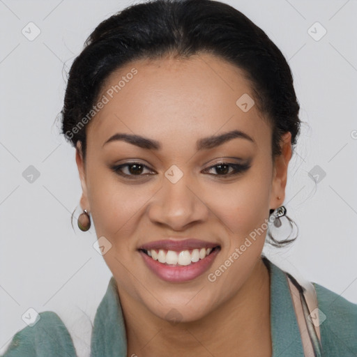 Joyful latino young-adult female with medium  brown hair and brown eyes