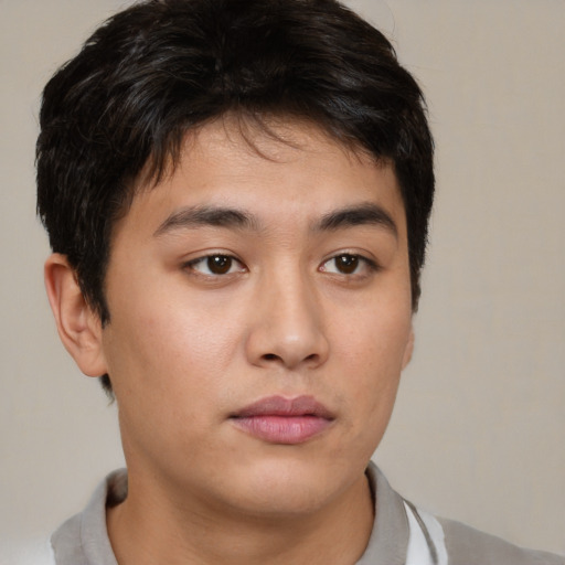 Neutral asian young-adult male with short  brown hair and brown eyes