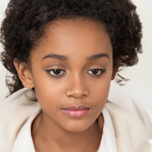 Joyful latino child female with medium  brown hair and brown eyes