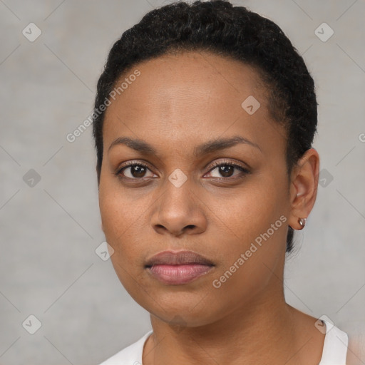 Neutral black young-adult female with short  black hair and brown eyes