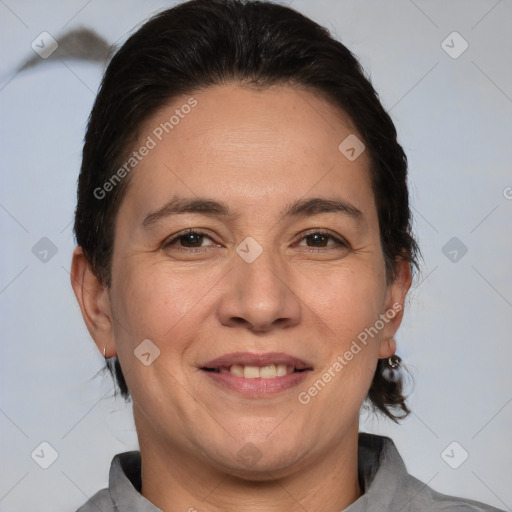 Joyful white adult female with medium  brown hair and brown eyes