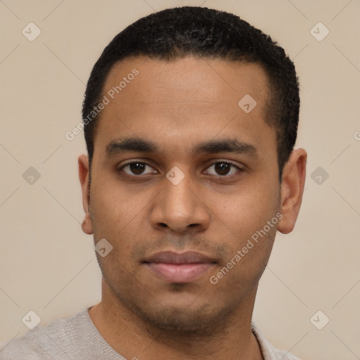 Neutral latino young-adult male with short  black hair and brown eyes