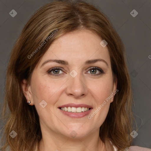 Joyful white adult female with medium  brown hair and grey eyes