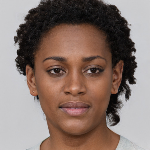 Neutral black young-adult female with short  brown hair and brown eyes