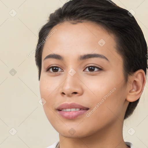 Joyful white young-adult female with short  brown hair and brown eyes