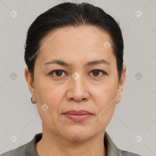 Joyful white adult female with short  brown hair and brown eyes