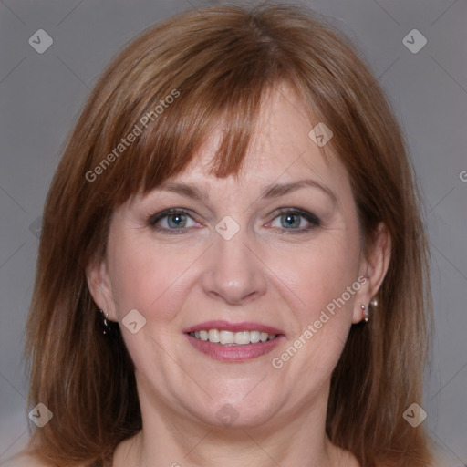 Joyful white adult female with medium  brown hair and grey eyes