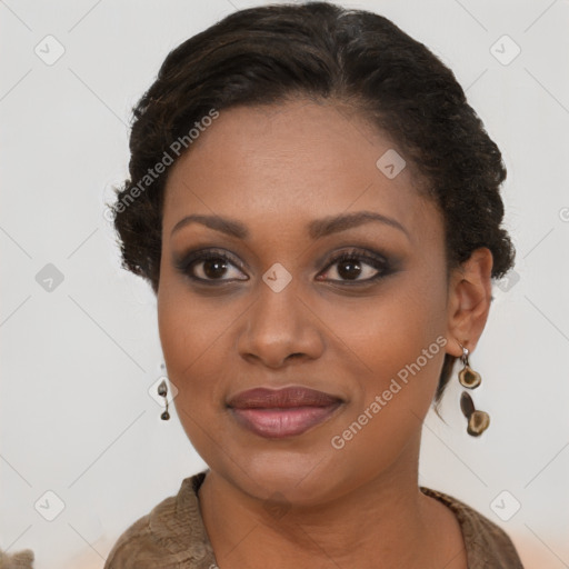 Joyful black young-adult female with long  brown hair and brown eyes