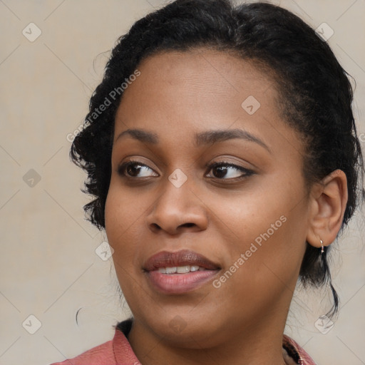 Joyful black young-adult female with medium  brown hair and brown eyes