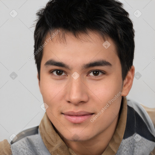 Joyful asian young-adult male with short  brown hair and brown eyes