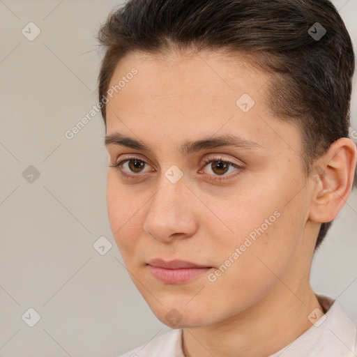 Joyful white young-adult female with short  brown hair and brown eyes