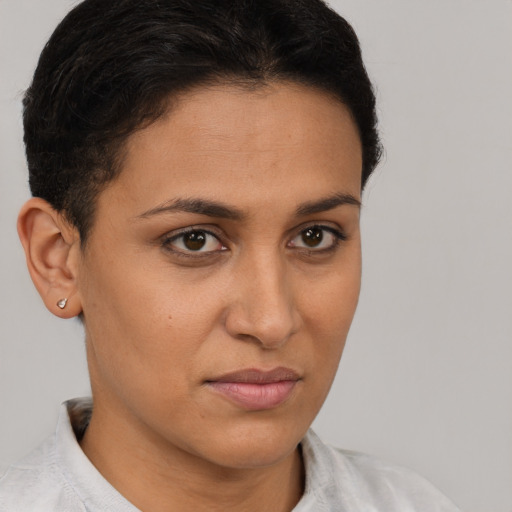 Neutral latino young-adult female with short  brown hair and brown eyes