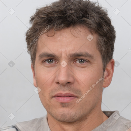 Neutral white adult male with short  brown hair and brown eyes