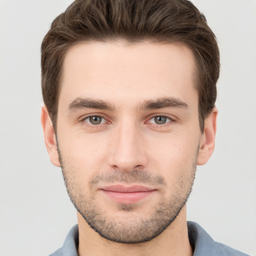 Neutral white young-adult male with short  brown hair and grey eyes