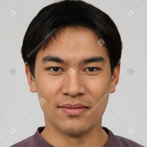 Joyful asian young-adult male with short  black hair and brown eyes