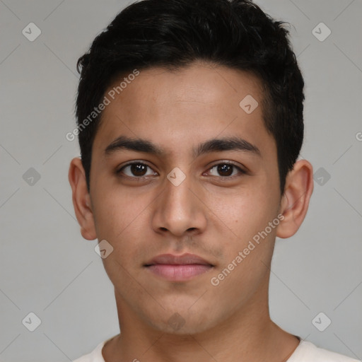 Neutral latino young-adult male with short  black hair and brown eyes