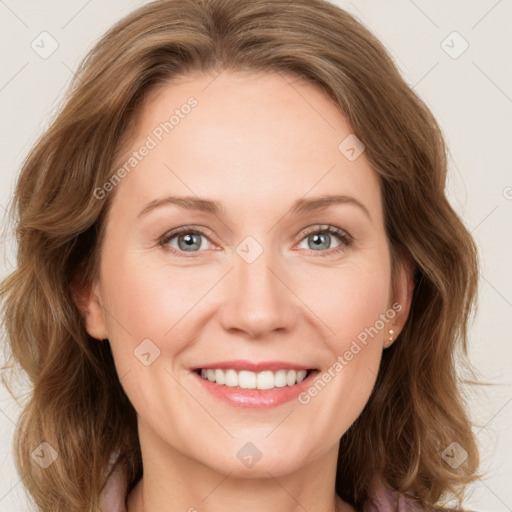 Joyful white young-adult female with medium  brown hair and blue eyes