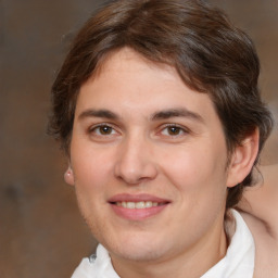 Joyful white young-adult male with medium  brown hair and brown eyes