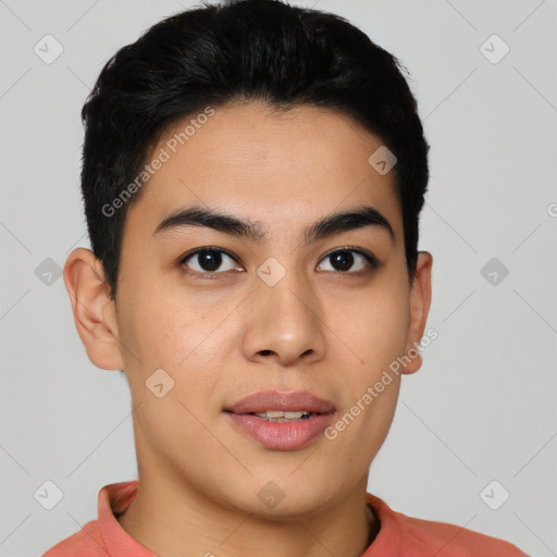 Joyful latino young-adult male with short  black hair and brown eyes