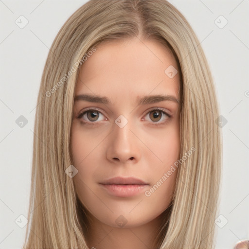 Neutral white young-adult female with long  brown hair and brown eyes