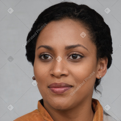 Joyful black young-adult female with medium  black hair and brown eyes