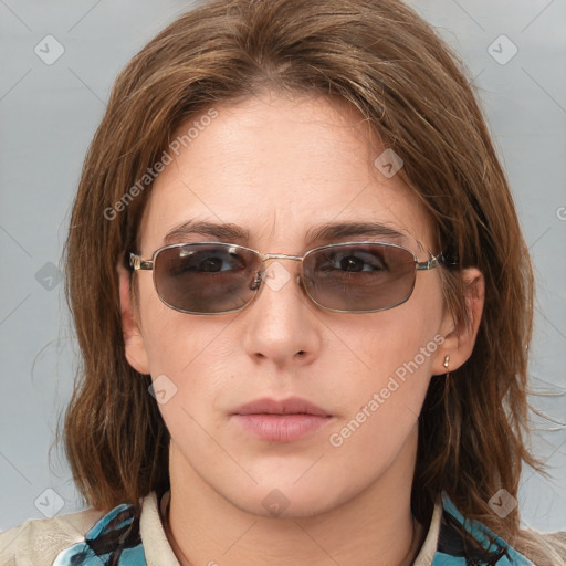 Neutral white young-adult female with medium  brown hair and brown eyes