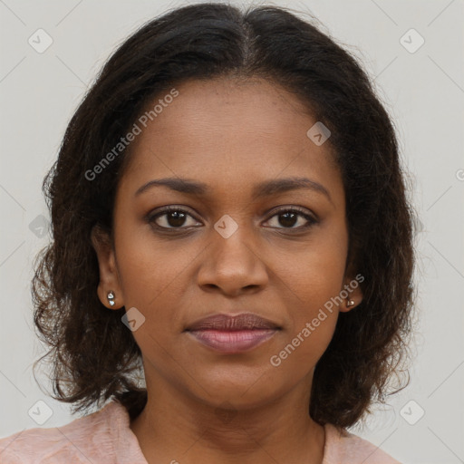 Joyful black young-adult female with medium  brown hair and brown eyes