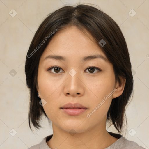 Neutral asian young-adult female with medium  brown hair and brown eyes