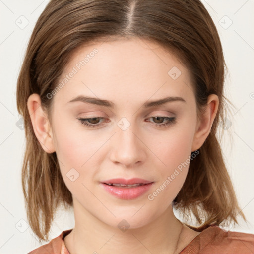 Joyful white young-adult female with long  brown hair and blue eyes