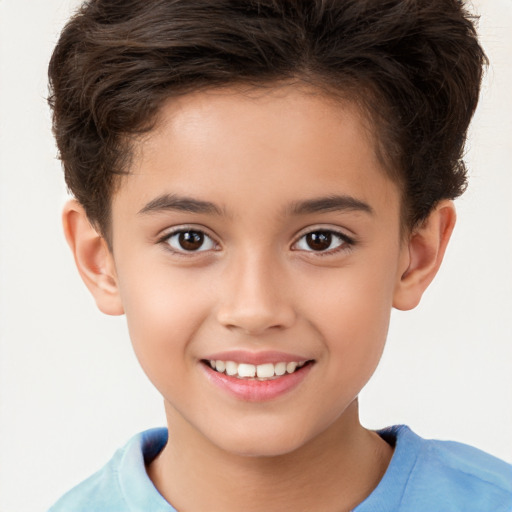 Joyful white child female with short  brown hair and brown eyes