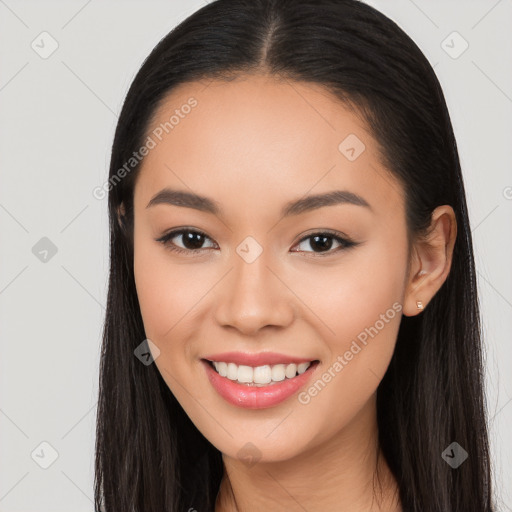 Joyful white young-adult female with long  black hair and brown eyes