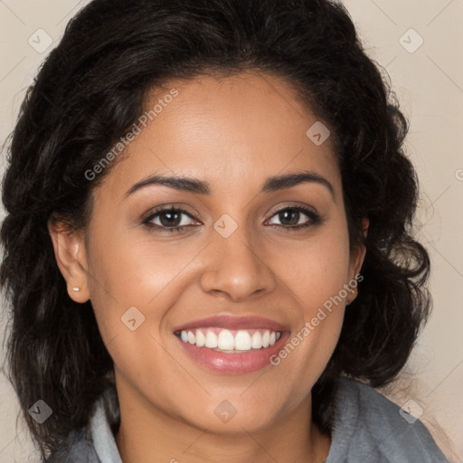 Joyful latino young-adult female with long  brown hair and brown eyes