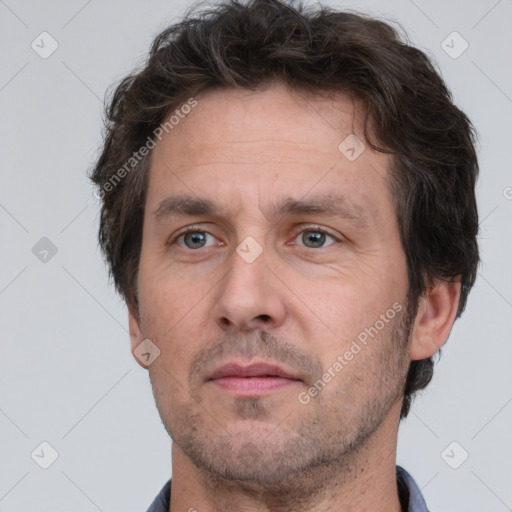 Neutral white adult male with short  brown hair and brown eyes