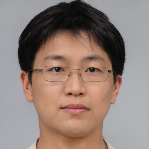 Neutral asian adult male with short  brown hair and brown eyes