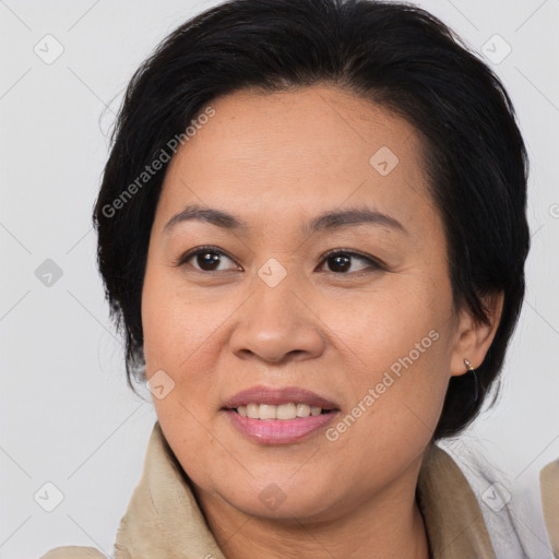 Joyful white adult female with medium  brown hair and brown eyes