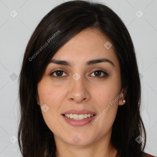 Joyful white young-adult female with long  brown hair and brown eyes