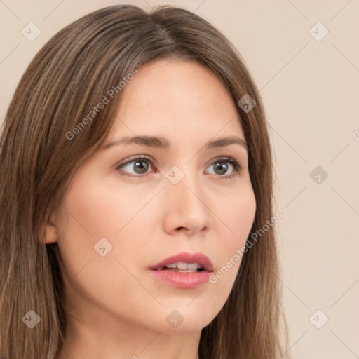 Neutral white young-adult female with long  brown hair and brown eyes