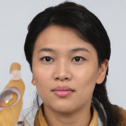 Neutral asian young-adult female with medium  brown hair and brown eyes