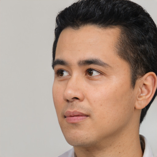 Neutral asian young-adult male with short  black hair and brown eyes