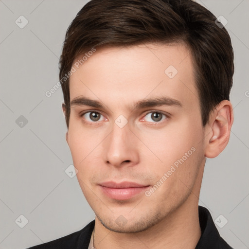 Neutral white young-adult male with short  brown hair and brown eyes