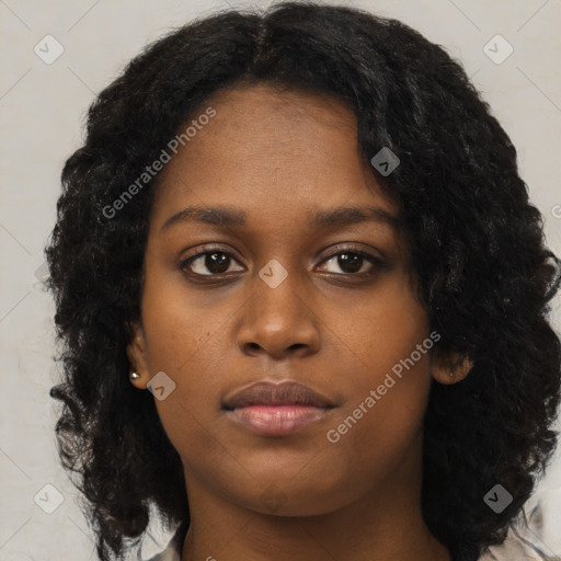 Neutral black young-adult female with medium  black hair and brown eyes