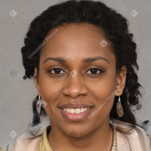 Joyful black young-adult female with long  black hair and brown eyes