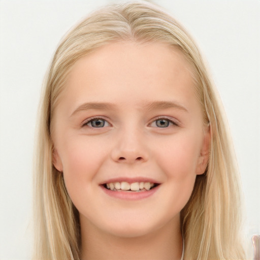 Joyful white child female with long  brown hair and blue eyes