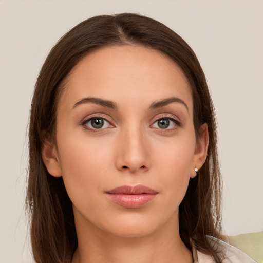 Neutral white young-adult female with long  brown hair and grey eyes